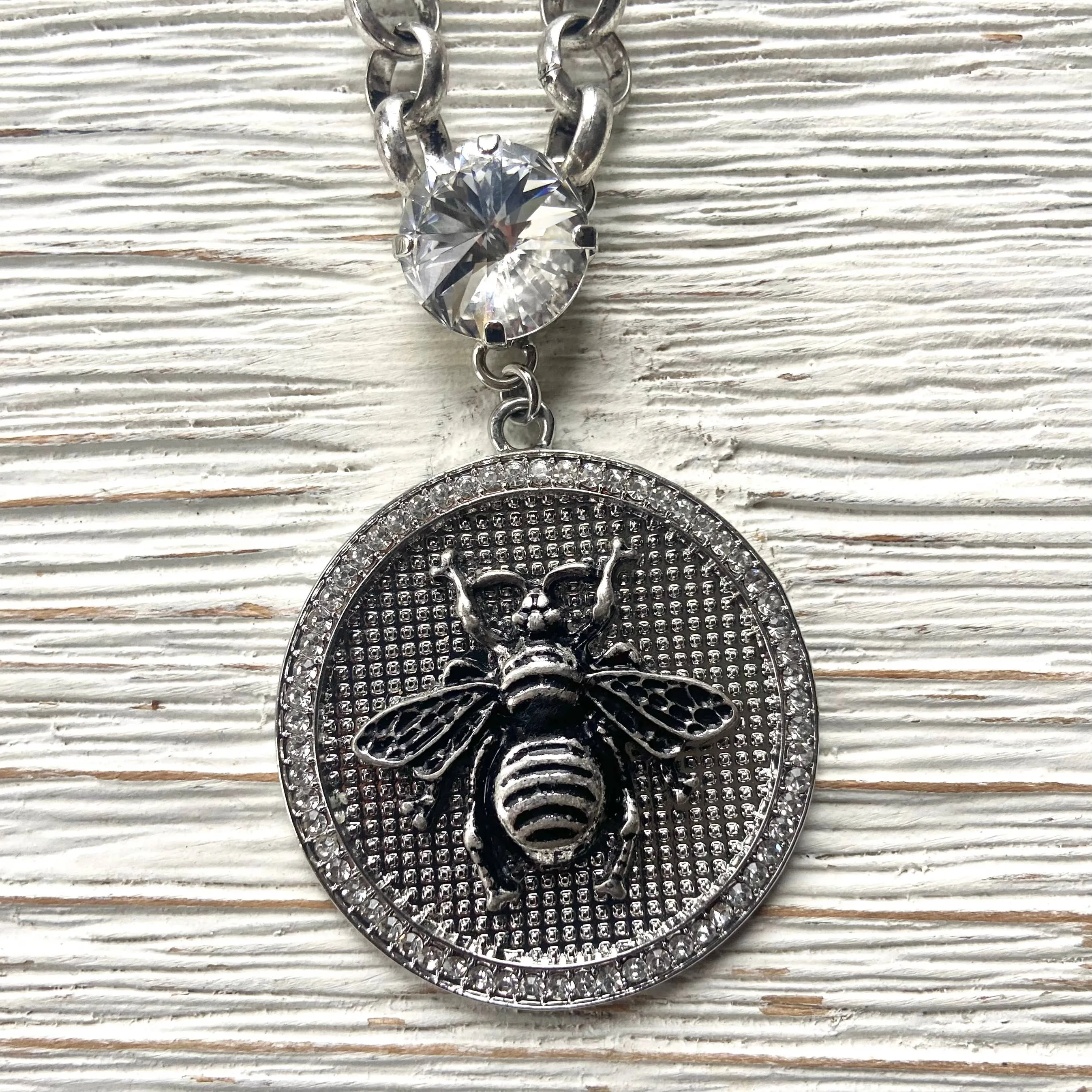 French bee statement coin necklace: Burnished silver