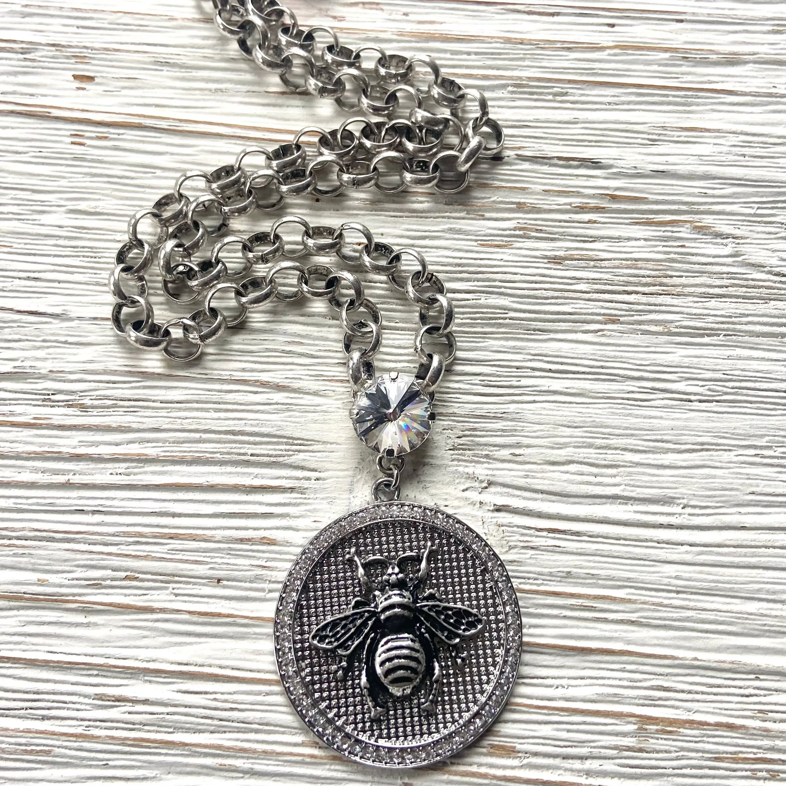 French bee statement coin necklace: Burnished silver