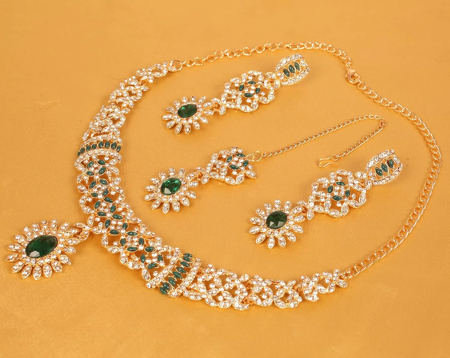 Touchstone Indian jewelry sets for women bollywood wedding kundan necklaces and punjabi look designer party jewellery set light bridal tikka simple design in gold or silver or white tone for women.